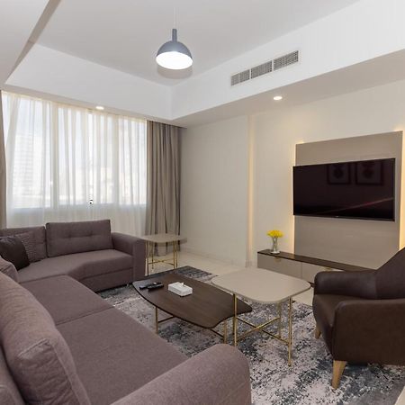 Platinum Coast Hotel Apartments Fudzsejra Kültér fotó Living room