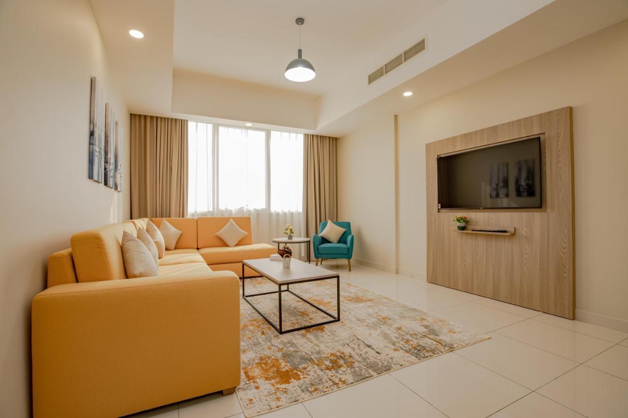 Platinum Coast Hotel Apartments Fudzsejra Kültér fotó Living room
