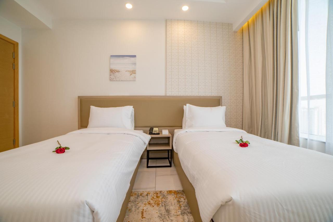 Platinum Coast Hotel Apartments Fudzsejra Kültér fotó Deluxe twin room
