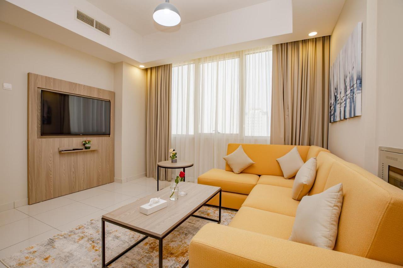 Platinum Coast Hotel Apartments Fudzsejra Kültér fotó Living room