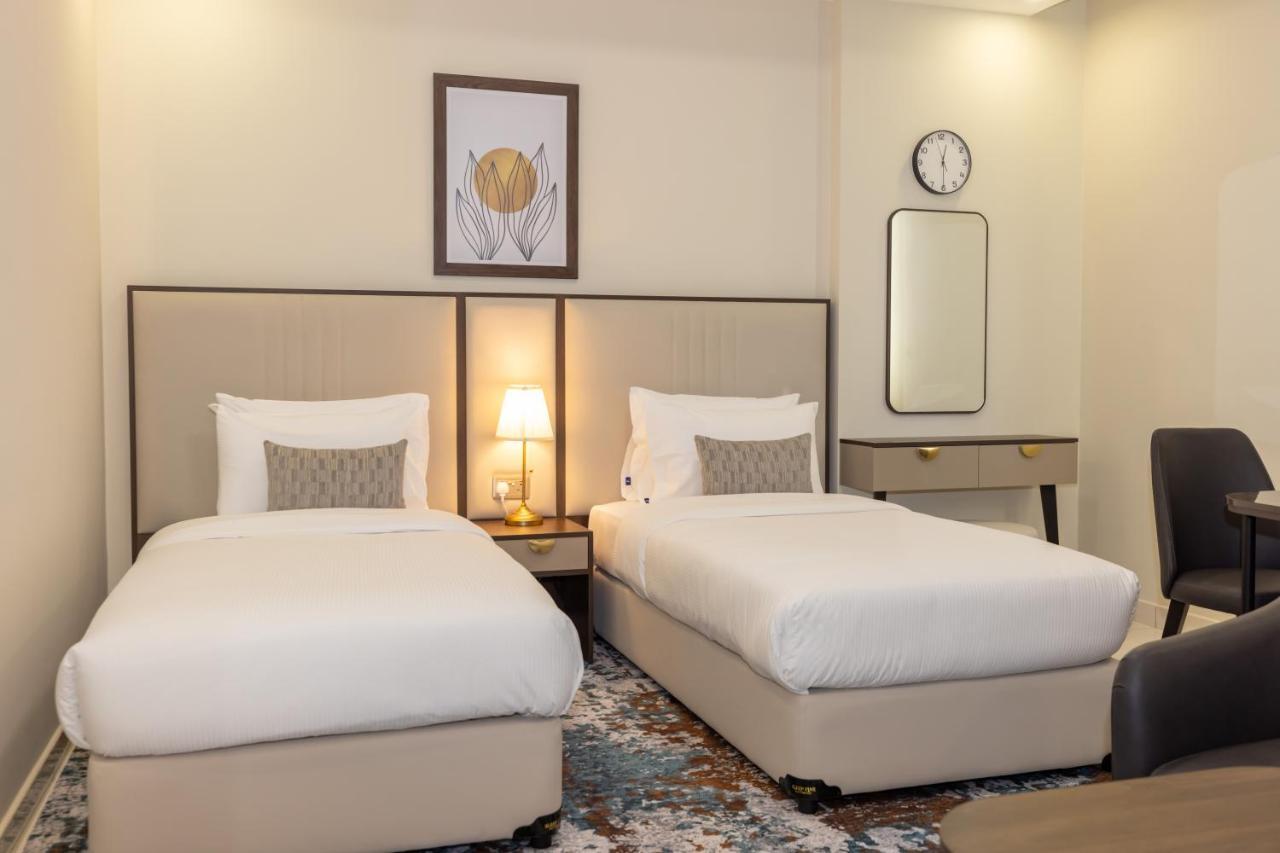 Platinum Coast Hotel Apartments Fudzsejra Kültér fotó Deluxe Room