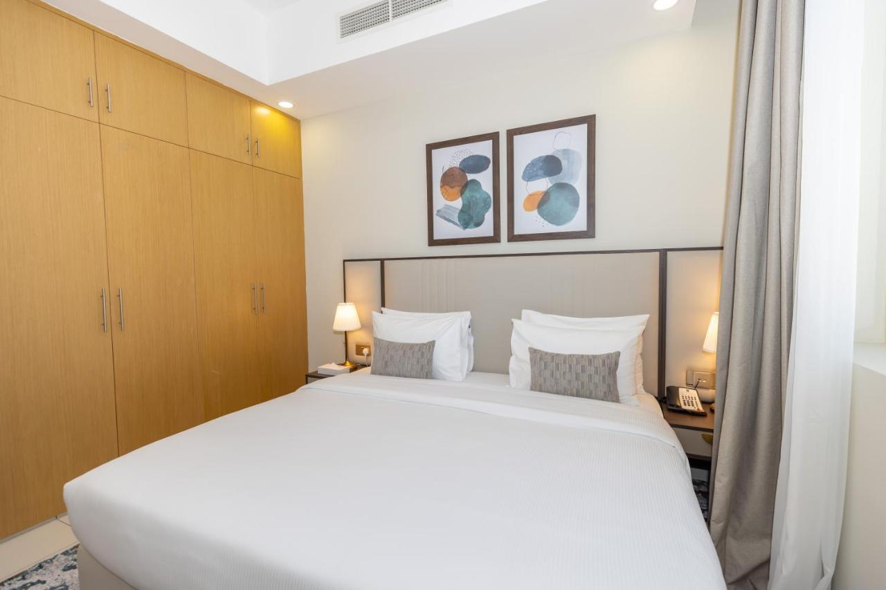 Platinum Coast Hotel Apartments Fudzsejra Kültér fotó A bedroom at the hotel